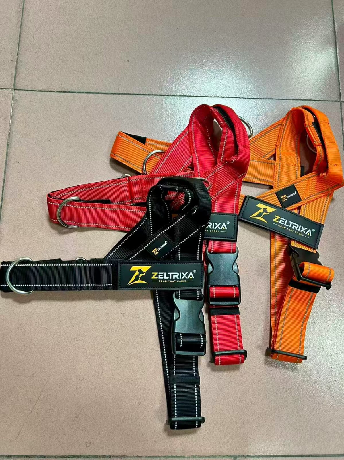 Zeltrixa harnesses in red, orange and black colorways